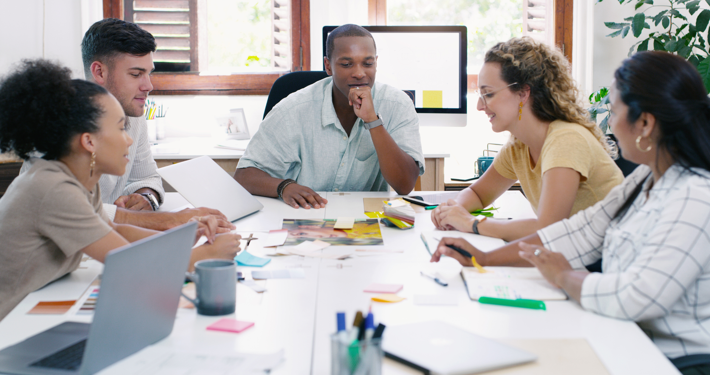 Young businesspeople having a meeting in a modern office