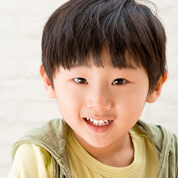 A happy Asian boy.