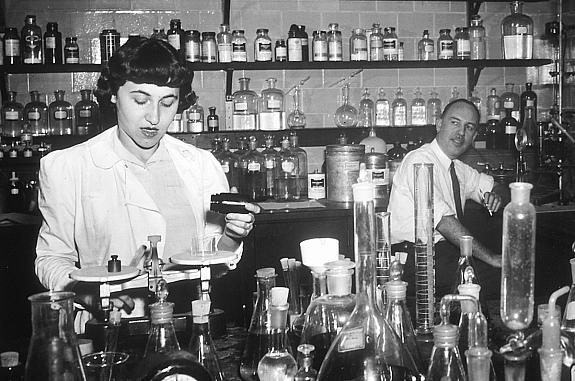 Dr. Jonathan Hartwell (right) and his assistant Sylvy R. Levy Kornberg conduct some of the earliest chemotherapy tests at the National Cancer Institute, about 1950.