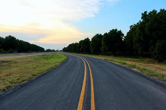 Highway road with clear skies above