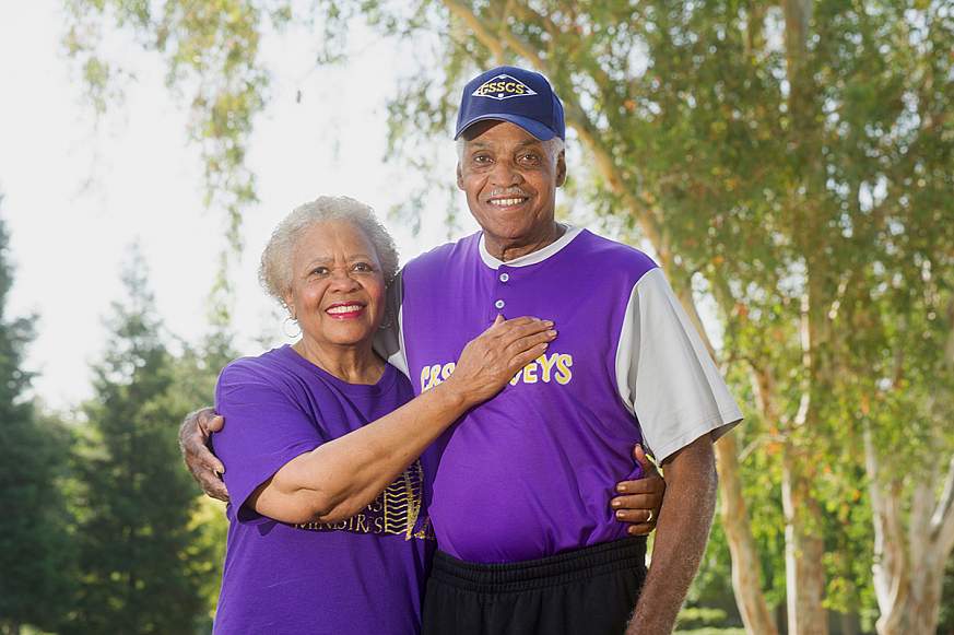 Ollie and Vernie Doolittle with their arms around each other.