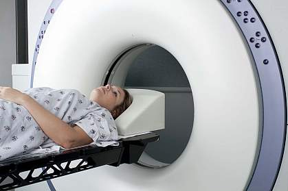 Woman in MRI scanner Woman in MRI scanner