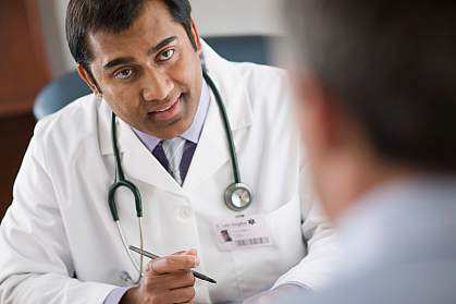 Picture of therapist congratulating a patient