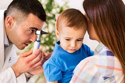 Otolaryngologist examining a child’s ear