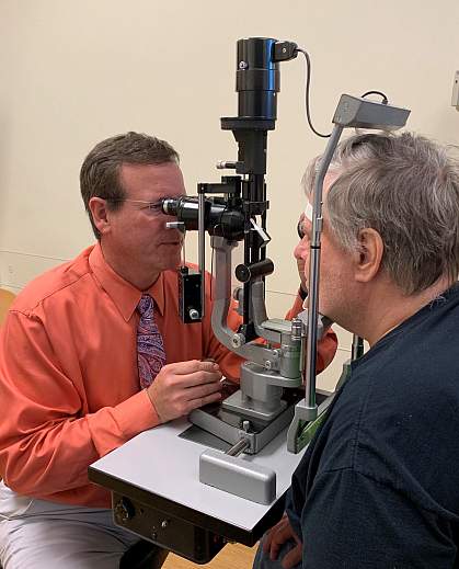 Doctor and participant in eye exam