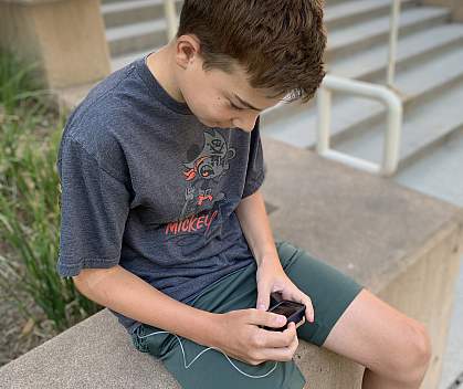 Study participant reviews information on his artificial pancreas device.