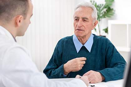 Older man talking to a doctor Older man talking to a doctor