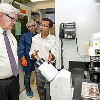 Former Speaker of the U.S. House of Representatives Newt Gingrich tours Dr. Kapil Bharti’s lab at the National Institutes of Health