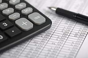 Save Calculator And Pen On Sheet - stock photo